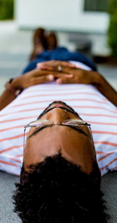 Person lying on their back.